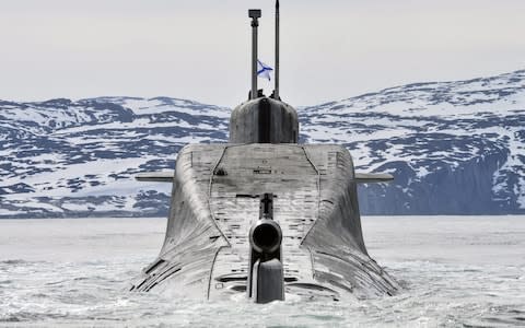 A Russian northern fleet nuclear submarine trains in the Arctic in 2018 - Credit: Lev Fedoseyev/TASS via Getty