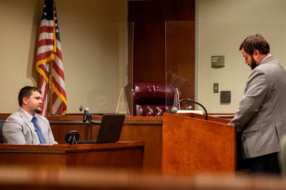 Damien Holcomb questions Gulfport Police Officer Klein on the witness stand during a preliminary hearing for a murder case at Harrison County Justice Court in Gulfport on Wednesday, Jan. 19, 2022.