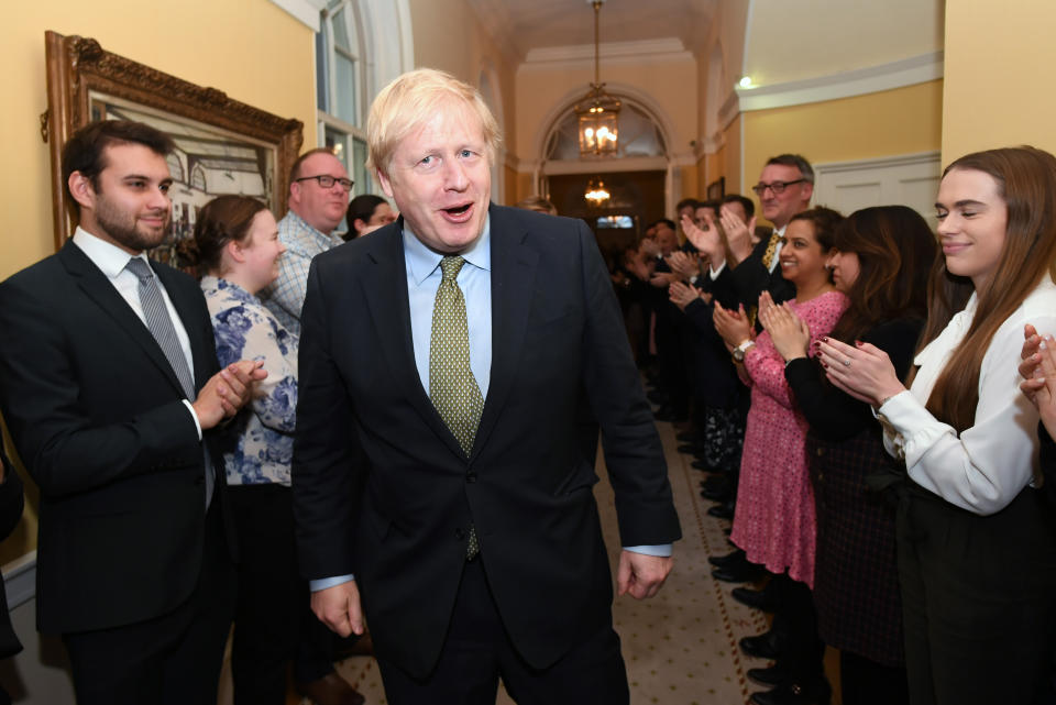 Mr Johnson was greeted by staff as he arrived back at 10 Downing Street (Picture: PA)