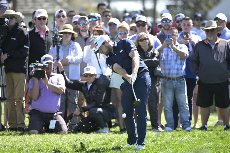 Tyrrell Hatton, of England, hits out of the rough along the first fairway during the third round of the Arnold Palmer Invitational golf tournament, Saturday, March 7, 2020, in Orlando, Fla. (AP Photo/Phelan M. Ebenhack)