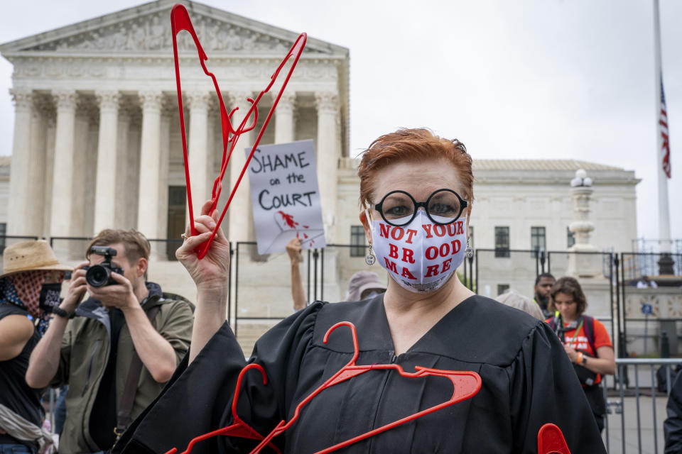 Christal Surowicz, of Cheverly, Md., poses for a portrait as she demonstrates for abortion rights, Saturday, May 14, 2022, outside the Supreme Court in Washington, during protests across the country. "I am a strong supporter of women's rights and I feel like abortion is a necessary evil. We don't think - let's go out and promote abortion, but we feel it needs to be available," she said. "The ramifications for it not being available are just too much. I think we don't give up, we fight. I'm honestly very discouraged at this point." (AP Photo/Jacquelyn Martin)