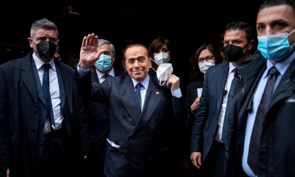 Silvio Berlusconi greets journalists in Rome in February 2021.