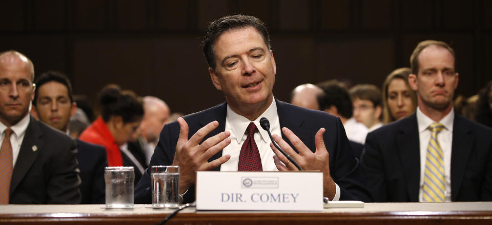 Former FBI Director James Comey testifies before a Senate Intelligence Committee hearing on Russia's alleged interference in the 2016 U.S. presidential election on Capitol Hill on June 8, 2017.