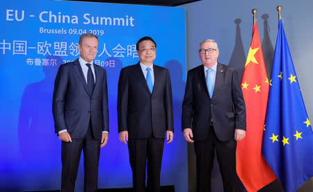 Chinese Premier Li Keqiang is welcomed by European Council President Donald Tusk and European Commission President Jean-Claude Juncker ahead of a EU China Summit in Brussels, Belgium, April 9, 2019. Olivier Hoslet/Pool via REUTERS