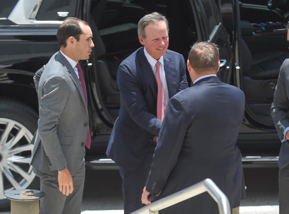 Former President Donald Trump's legal team (from left) Stephen Weiss and Chris Kise arrive on U.S. 1 in front of the Alto Lee Adams Sr. U.S. Courthouse in Fort Pierce, Fla., on Tuesday, July 18, 2023.