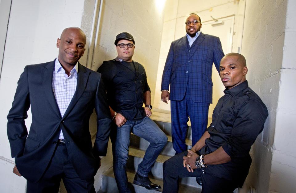 In this June 11, 2012 photo, gospel singers Donnie McClurkin, from left, Israel Houghton, Marvin Sapp and Kirk Franklin, are photographed backstage before taping a television show in Atlanta. There is a lot riding on the expanding brand of gospel music through the upcoming King's Men concert tour featuring Franklin, Sapp, McClurkin and Houghton. The King’s Men concert series will be the first gospel tour backed by Live Nation Inc., the world's largest concert promoter. It’s also the first step toward proving that the genre can broaden its fan base and become a lucrative business for the promotional company. (AP Photo/David Goldman)