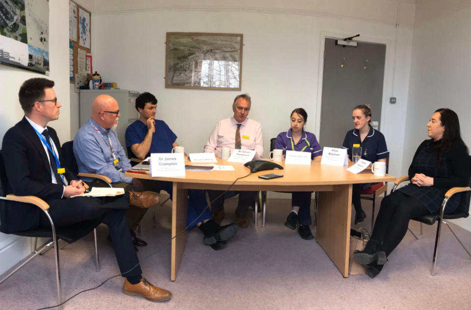 Handout photo issued by QueenÕs Hospital Burton of Staff from the hospital in Staffordshire, where the first frontline NHS worker to die after contracting coronavirus worked, joining in a conversation via telephone speakerphone with the Duke and Duchess of Cambridge on Wednesday. (left to right) Dr James Crampton, QueenÕs Hospital Medical Director, Gavin Boyle, Chief Executive of University Hospitals Derby and Burton NHS Foundation Trust, Richard Welch, ITU staff nurse, Mr Adrian Thompson, Ear, Nose and Throat (ENT) Consultant, Brogan Bishop, newly qualified staff nurse in the Emergency Department, Alice Bloxham, Sister on Ward 4, Covid-19 cohort ward, Chelsey Stephens, Staff nurse in Paediatrics.