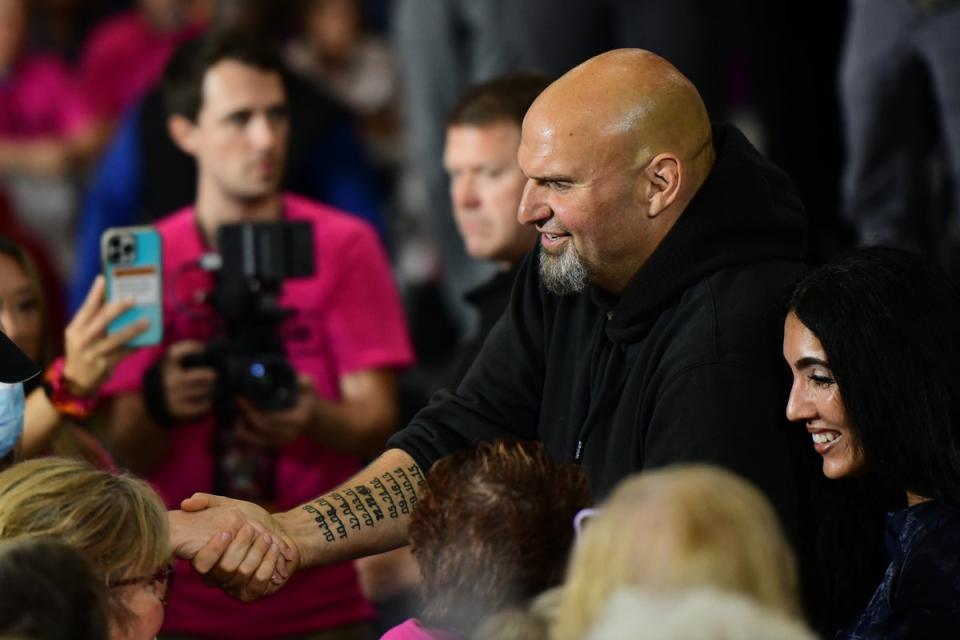 Democratic Pennsylvania Senate nominee John Fetterman greets supporters during a rally in Blue Bell, Pennsylvania (Getty Images)