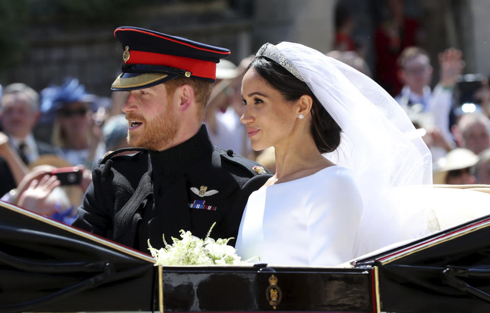 Meghan Markle and Prince Harry leav after their wedding at St. George’s Chapel in Windsor Castle in Windsor, near London, England, Saturday, May 19, 2018. (Gareth Fuller/pool photo via AP)