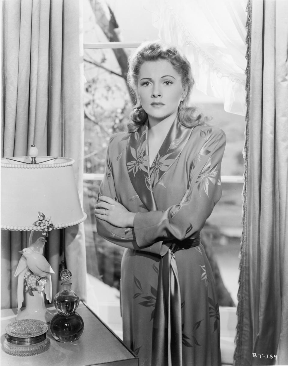 Fontaine wears a robe with a floral pattern in Alfred Hitchcock's "Suspicion," 1941.&nbsp;