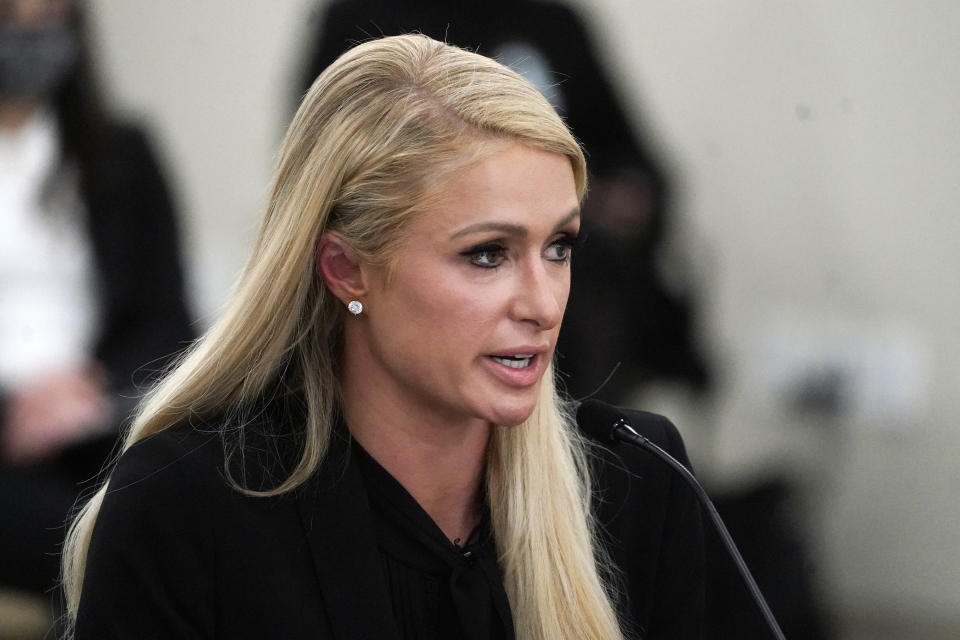 Paris Hilton speaks at a committee hearing at the Utah State Capitol, Monday, Feb. 8, 2021, in Salt Lake City. Hilton has been speaking out about abuse she says she suffered at a boarding school in Utah in the 1990s and she testified in front of state lawmakers weighing new regulations for the industry. (AP Photo/Rick Bowmer)