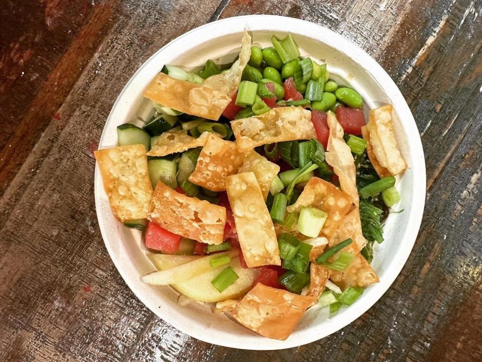 Spicy Citrus Ponzu with tuna signature poke bowl at Poke Guru in Garage Food Hall.