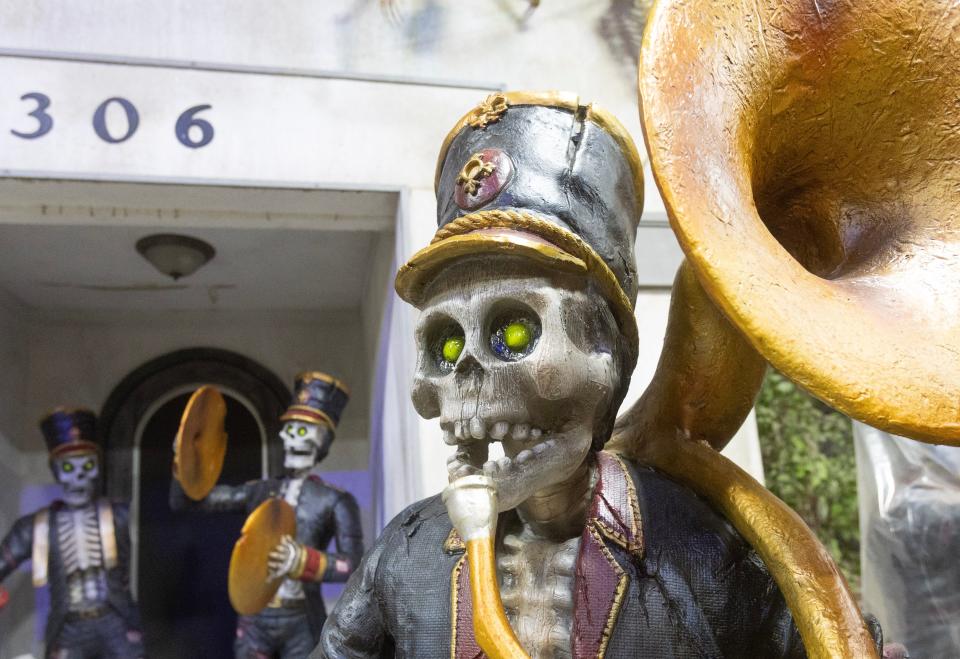 The Bourbon Street band watches over the Factory of Terror in Canton. The haunted attraction opens Saturday for the season.