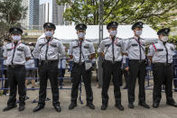 <p>Security guards stand in front of a gate of the Olympic Torch Relay Celebration event venue during a protest against Tokyo 2020 Olympics on July 23, 2021 in Tokyo, Japan. Protesters gathered to demonstrate against the Olympic Games amid concern over the safety of holding the event during the global coronavirus pandemic as well as the cost incurred. (Photo by Yuichi Yamazaki/Getty Images)</p> 