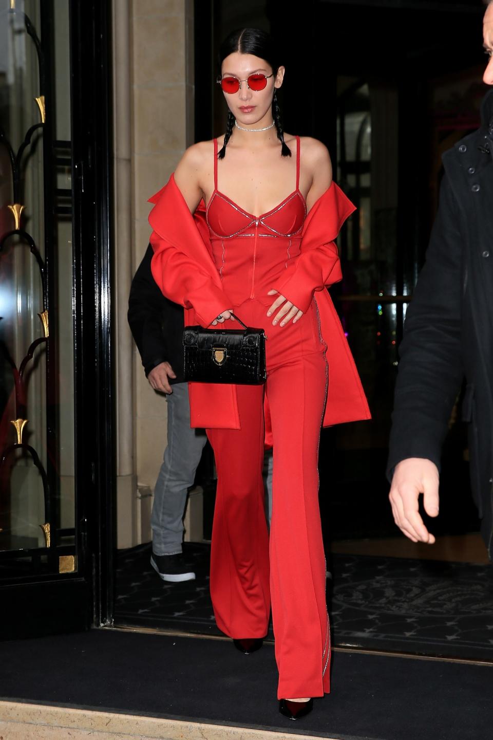 <p>Nothing screams “I just want to blend in” quite like a head-to-toe, bright red ensemble. Perhaps this is a new line of Hillary Clinton inspired power-suits that can be worn to the office and an all-night rave. Pass us a glow-stick, Bella! </p>