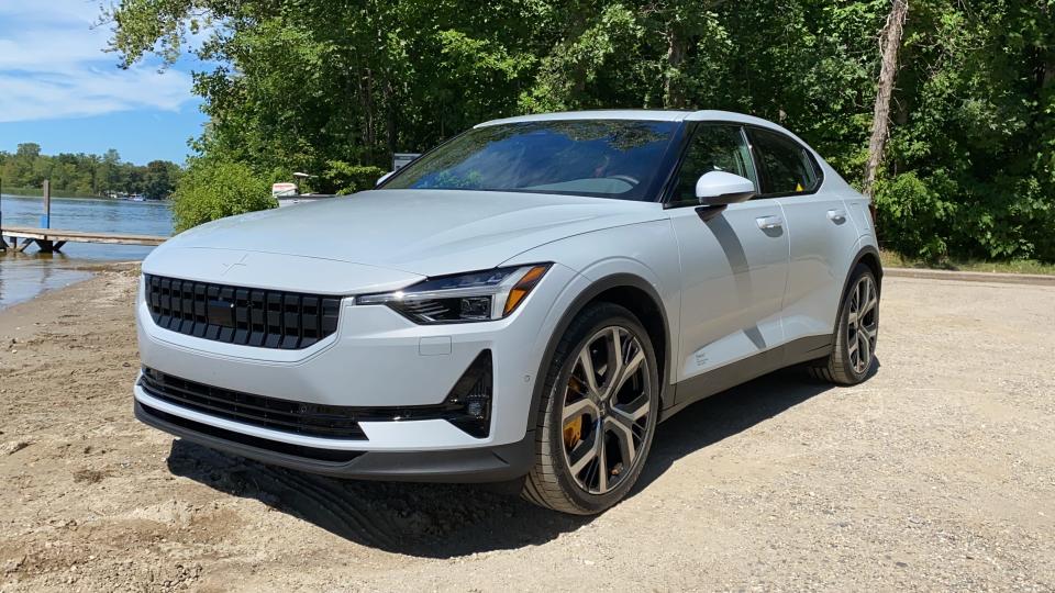 The 2021 Polestar 2 electric car has a long hood and roofline, 4.45-second 0-60 mph acceleration and responsive handling.