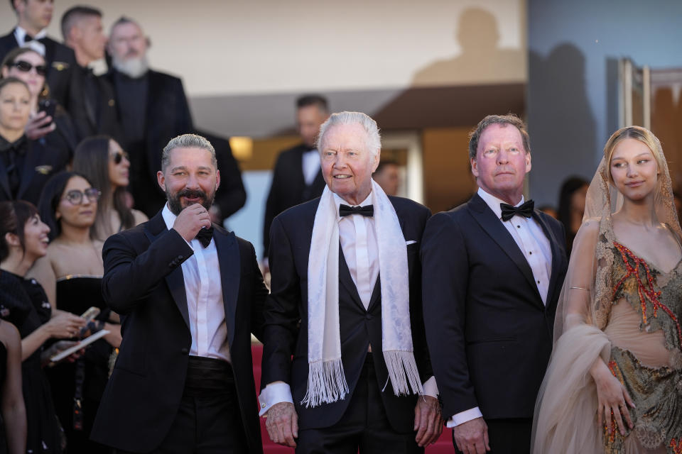 Shia LaBeouf, from left, Jon Voight, D. B. Sweeney, and Grace VanderWaal pose for photographers upon arrival at the premiere of the film 'Megalopolis' at the 77th international film festival, Cannes, southern France, Thursday, May 16, 2024. (Photo by Andreea Alexandru/Invision/AP)