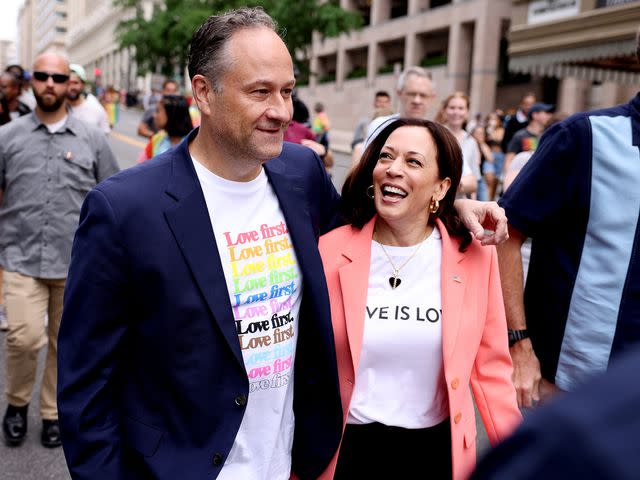 <p>Anna Moneymaker/Getty</p> Kamala Harris and husband Doug Emhoff join marchers for the Capital Pride Parade on June 12, 2021 in Washington, DC.