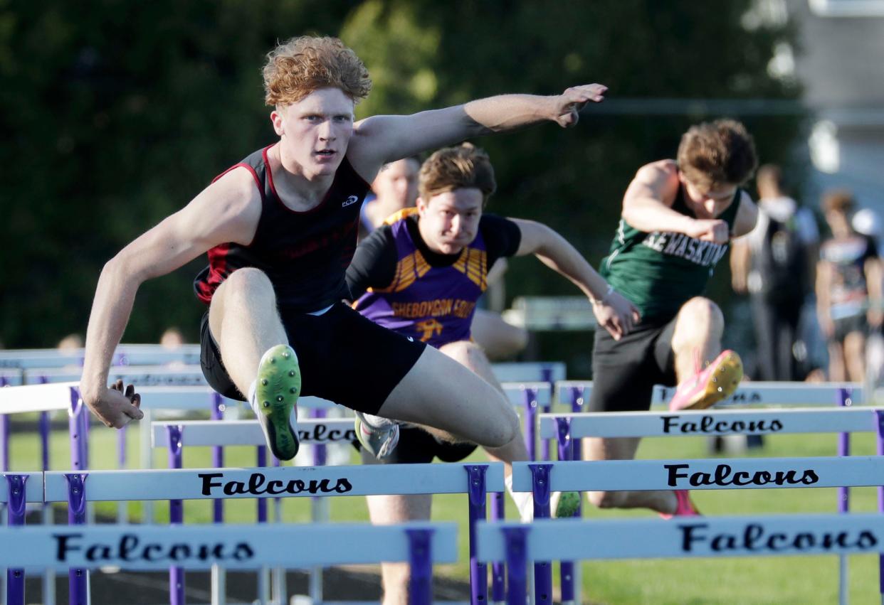 Elkhart Lake-Glenbeulah’s Brody Feldmann clears the hurdle on his finals win during the 53rd Annual Vanderpan Track Invitational, Friday, May 3, 2024, in Sheboygan Falls.
