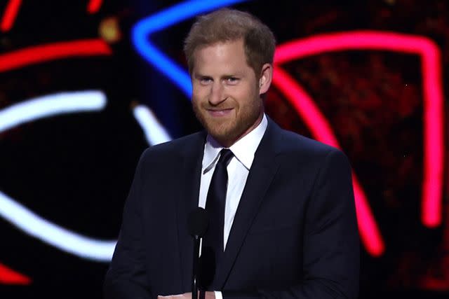 <p>Perry Knotts/Getty</p> Prince Harry presents the Walter Payton Man of the Year Award at the 13th Annual NFL Honors on February 8 in Las Vegas.