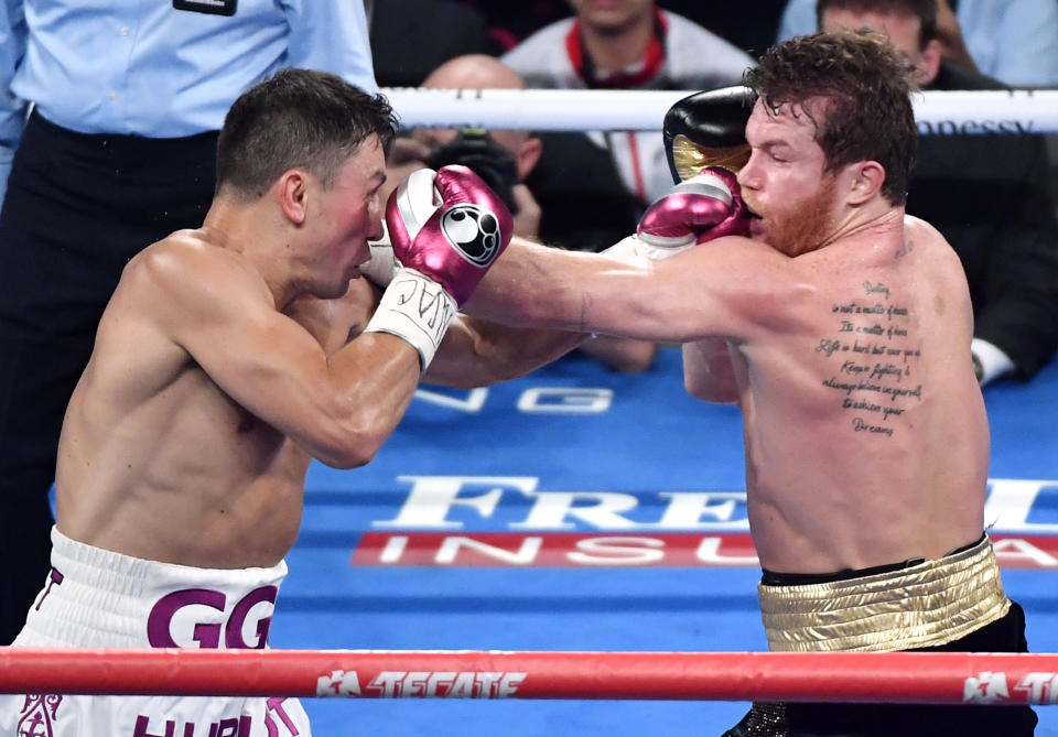 Gennady Golovkin hits Canelo Alvarez Saturday during their rematch at T-Mobile Arena in Las Vegas. (Getty Images)