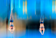 LONDON, ENGLAND - AUGUST 01: Troy Dumais and Kristian Ipsen of the United States compete in the Men's Synchronised 3m Springboard final on Day 5 of the London 2012 Olympic Games at the Aquatics Centre on August 1, 2012 in London, England. (Photo by Adam Pretty/Getty Images)