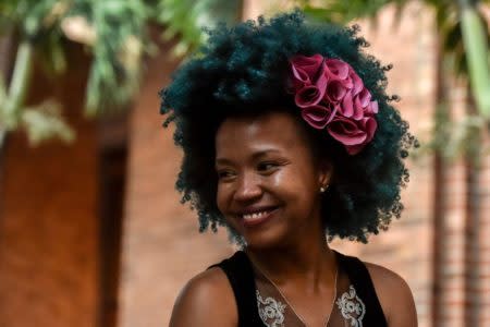 A girl shows an Afro-Colombian hairstyle during the 13th contest of Afro hairdressers 