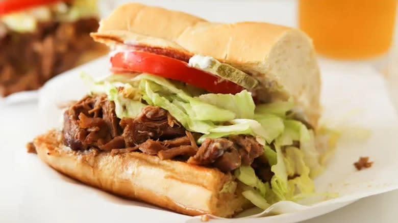 Closeup of a roast beef po'boy sandwich 