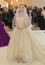 <p>Bosworth channeled a porcelain doll in this Oscar de la Renta gown and veil. (Photo: Getty Images) </p>
