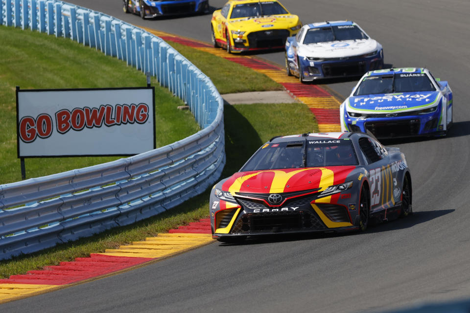 Bubba Wallace make his way through Turn 2 during a NASCAR Cup Series auto race in Watkins Glen, N.Y., Sunday, Aug. 20, 2023. (AP Photo/Jeffrey T. Barnes)