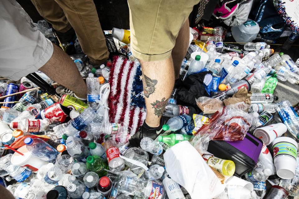 TULSA, OK - JUNE 20: Demonstrators stand in garbage at a security fence before President Donald Trump's campaign rally on June 20, 2020 in Tulsa, Oklahoma. Trump is scheduled to hold his first political rally since the start of the coronavirus pandemic at the BOK Center while infection rates in the state of Oklahoma continue to rise. (Photo by Brett Deering/Getty Images)