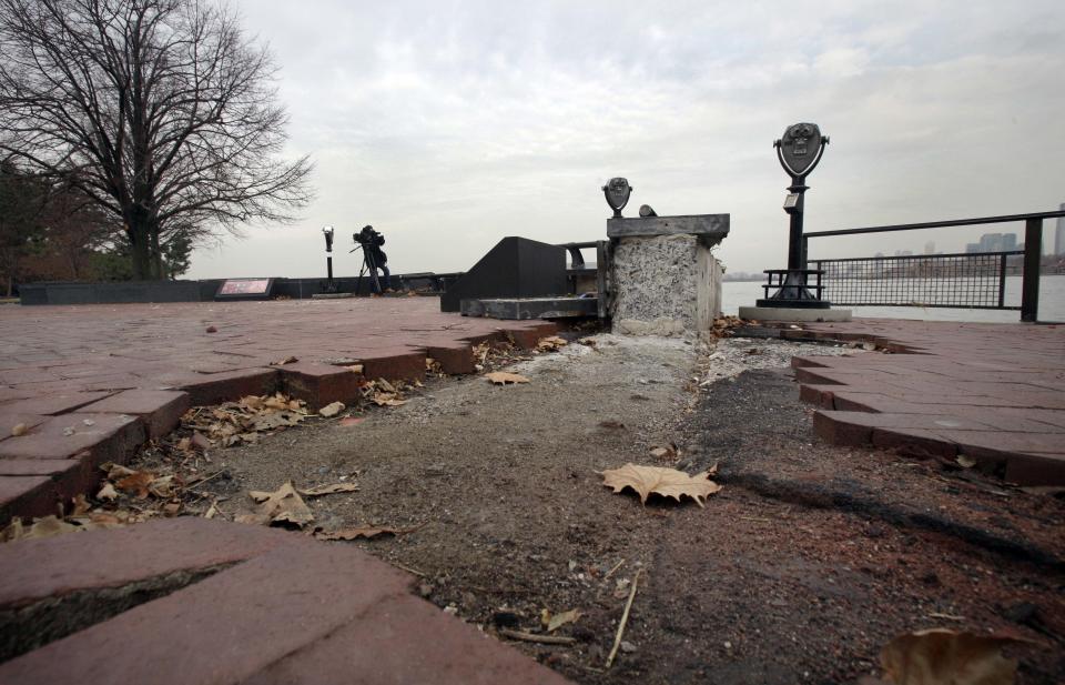 Parts of the brick walkway of Liberty Island that were damaged in Superstorm Sandy were shown during a tour, in New York, Friday, Nov. 30, 2012. Tourists in New York will miss out for a while on one of the hallmarks of a visit to New York, seeing the Statue of Liberty up close. Though the statue itself survived Superstorm Sandy intact, damage to buildings and Liberty Island's power and heating systems means the island will remain closed for now, and authorities don't have an estimate on when it will reopen. (AP Photo/Richard Drew)