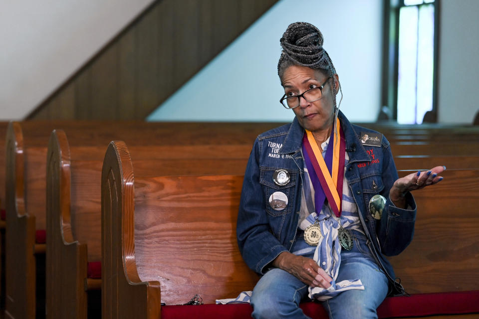 Civil Rights foot soldier Della Simpson Maynor talks on May 19, 2023, about being clubbed by police on Feb. 18, 1965, the night activist Jimmie Lee Jackson was fatally wounded, while seated near the scene of the confrontation in Zion Church in Marion, Ala. The 14-year-old Maynor was part of a group planning to march to the Perry County jail where a local SCLC field secretary was being held for registering voters. Maynor also heard the gunshots that killed Jackson during the struggle. (AP Photo/Julie Bennett)