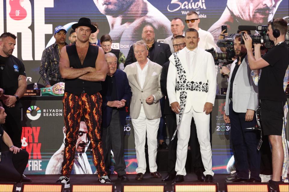 Fury (centre left) and Usyk at Thursday’s press conference for their fight (Getty Images)