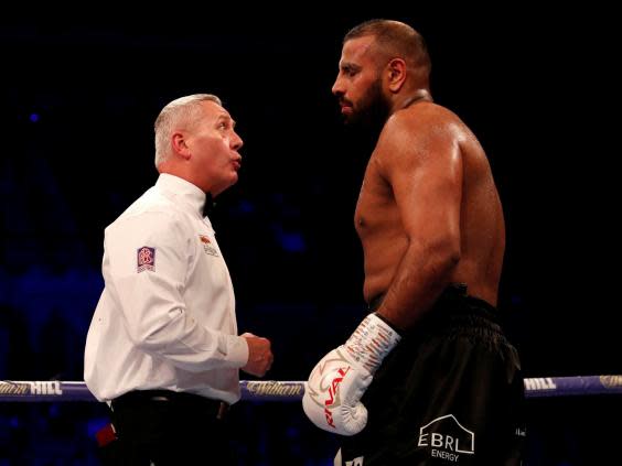 Kash Ali was disqualified by referee Mark Lyson for biting David Price (Action Images)
