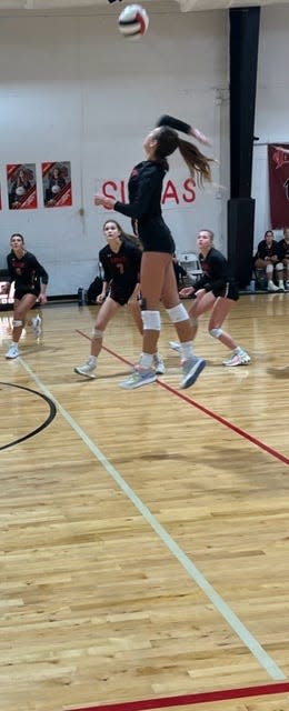 Jupiter Christian outside hitter Ella Brodner prepares to spike the ball against Highlands Christian in a Region 4-2A quarterfinal match Tuesday night in Jupiter.