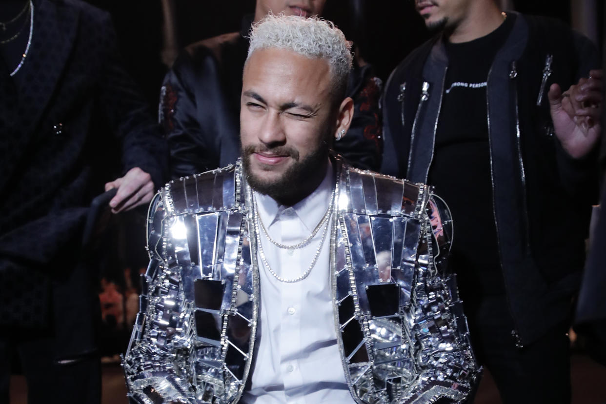 Soccer player Neymar attends the Balmain Mens Fall/Winter 2020-2021 fashion collection presented in Paris, Friday Jan. 17, 2020. (AP Photo/Christophe Ena)