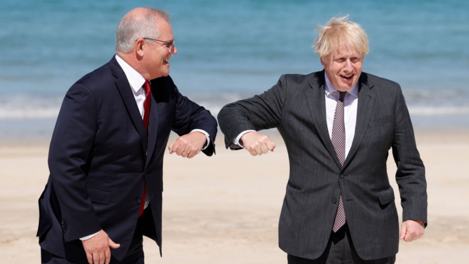 Prime Ministers Scott Morrison and Boris Johnson will release further details of the deal later on Tuesday. (Image: Getty).