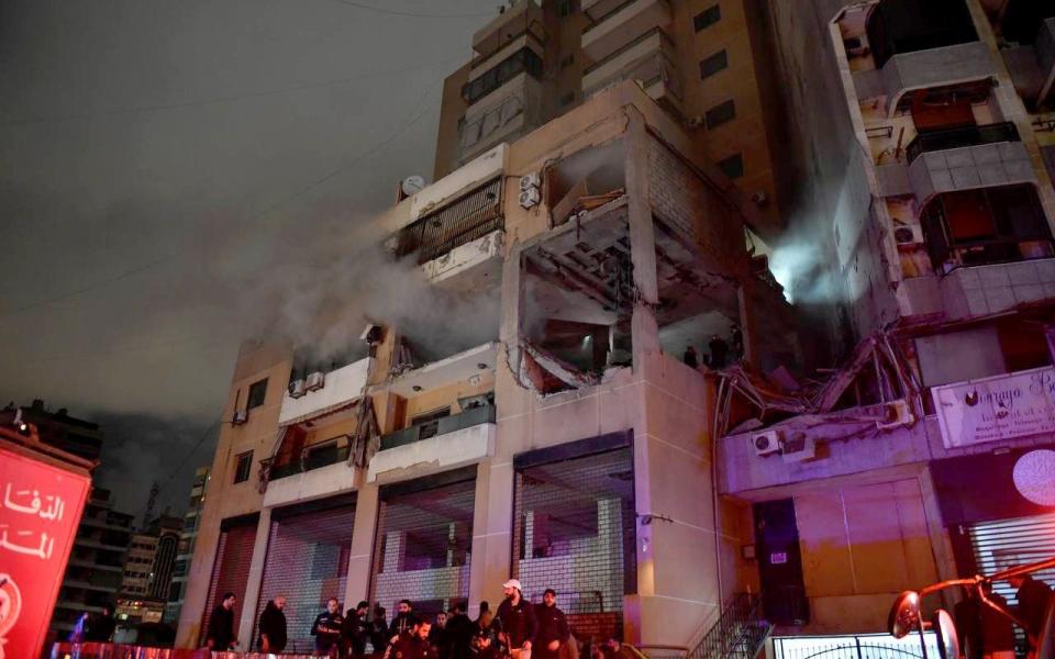 Smoke rises after an explosion occurred in the southern suburbs of Beirut