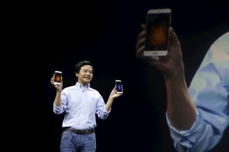 Lei Jun, founder and CEO of China's mobile company Xiaomi, displays Xiaomi Mi 5 at its launch ceremony, in Beijing, China, February 24, 2016. REUTERS/Jason Lee