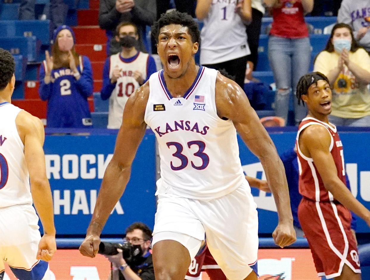 Kansas basketball junior forward David McCormack celebrates after scoring a basket late in the second half of the No. 6-ranked Jayhawks' contest against Oklahoma at Allen Fieldhouse in Lawrence. McCormack scored a game-high 17 points in KU's 63-59 victory.