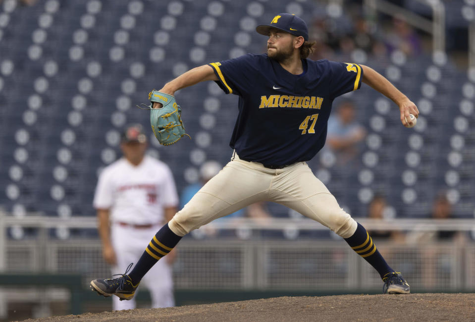 Michigan's Jacob Denner (47) pitches against Rutgers in the third inning of the NCAA college Big Ten baseball championship game Sunday, May 29, 2022, at Charles Schwalb Field in Omaha, Neb. (AP Photo/Rebecca S. Gratz)