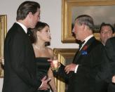 <p>The couple is pictured here with Prince Charles at the De Young Museum in 2005. They separated in January of that year, citing <a href="https://www.sfgate.com/bayarea/matier-ross/article/Newsom-wife-decide-to-end-3-year-marriage-3324582.php" rel="nofollow noopener" target="_blank" data-ylk="slk:the strain of having careers on opposite coasts;elm:context_link;itc:0;sec:content-canvas" class="link ">the strain of having careers on opposite coasts</a>, and <a href="https://www.sfgate.com/news/article/Gavin-and-Kimberly-are-officially-divorced-2521971.php" rel="nofollow noopener" target="_blank" data-ylk="slk:were officially divorced in March 2006;elm:context_link;itc:0;sec:content-canvas" class="link ">were officially divorced in March 2006</a>.</p>