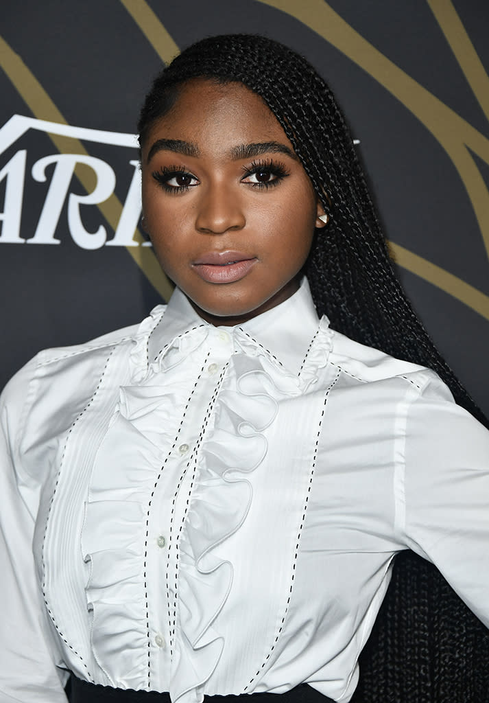 <p>The Fifth Harmony singer kept it simple and chic with long box braids, bold brows, lush lashes, and a nude lip. (Photo: Frazer Harrison/Getty Images) </p>