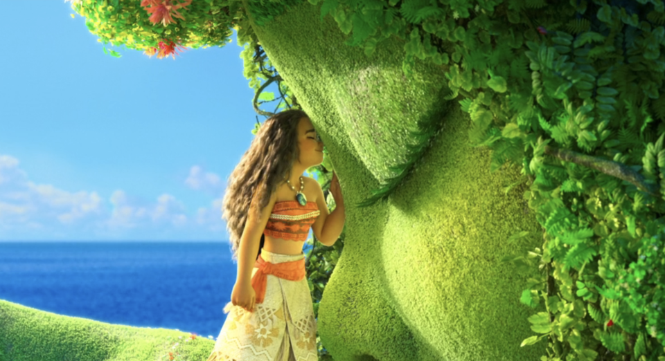 Moana leaning her forehead and nose on Te Fiti