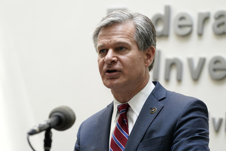 FILE - FBI Director Christopher Wray speaks during a news conference Aug. 10, 2022, in Omaha, Neb. The FBI has said it opens a new counterintelligence investigation involving China every 10 hours on average. “The Chinese government is set on stealing your technology — whatever it is that makes your industry tick — and using it to undercut your business and dominate your market,” Wray told business leaders in a recent speech in London. (AP Photo/Charlie Neibergall, File)