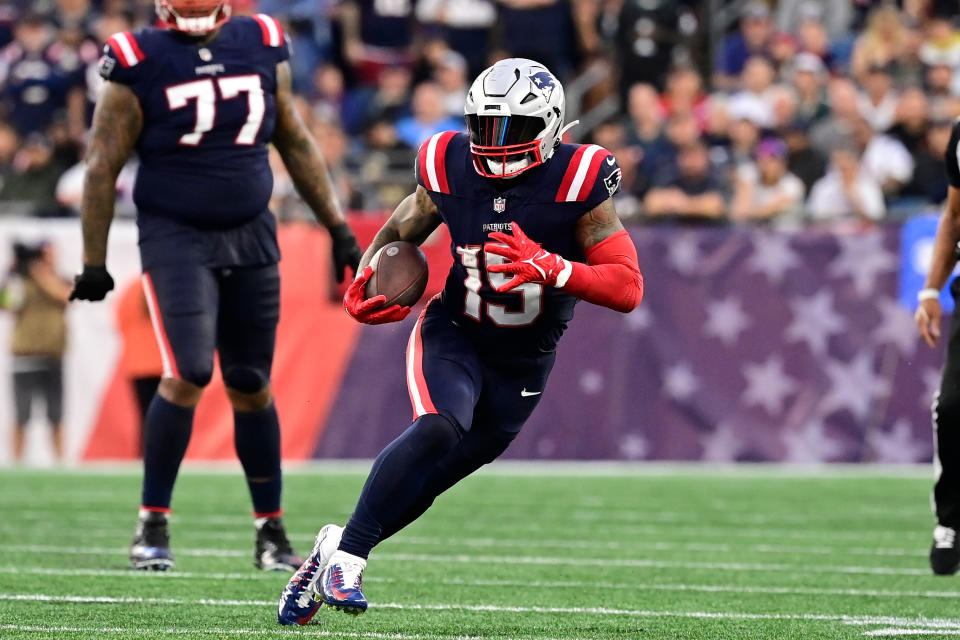 Sep 10, 2023; Foxborough, Massachusetts, USA; New England Patriots running back Ezekiel Elliott (15) runs the ball during the second half against the Philadelphia Eagles at Gillette Stadium. Mandatory Credit: Eric Canha-USA TODAY Sports