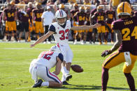 Arizona kicker Tyler Loop (33) kicks a field goal against Arizona State in the first half during an NCAA college football game, Saturday, Nov. 27, 2021, in Tempe, Ariz. (AP Photo/Rick Scuteri)