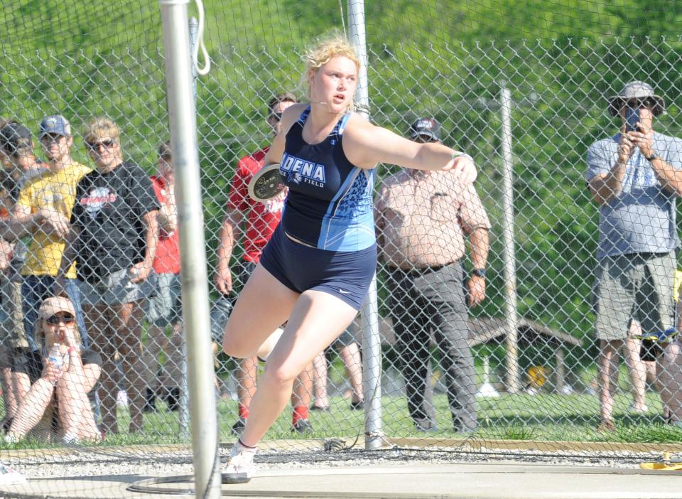 Adena's Sydney Foglesong during the girls' discus in the Division III regional track and field meet at Heath High School on May 26, 2023.