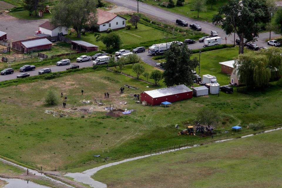 The FBI, Rexburg PD and Fremont County Sheriff's Office descend upon Chad Daybell's home and property in search of the missing children. / Credit: AP